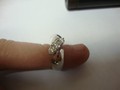 Помолвочное кольцо из белого золота с тремя бриллиантами сделано на заказ